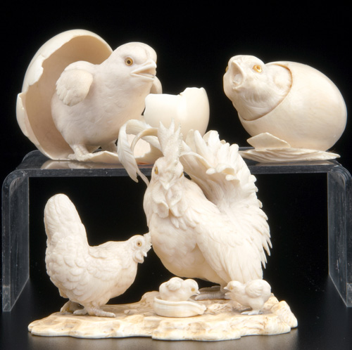 Appraisal: JAPANESE IVORY Three carved okimonos Meiji period rooster with hen