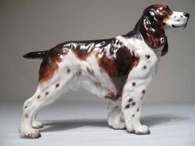 Appraisal: Royal Doulton porcelain painted figurine of a dog Good condition