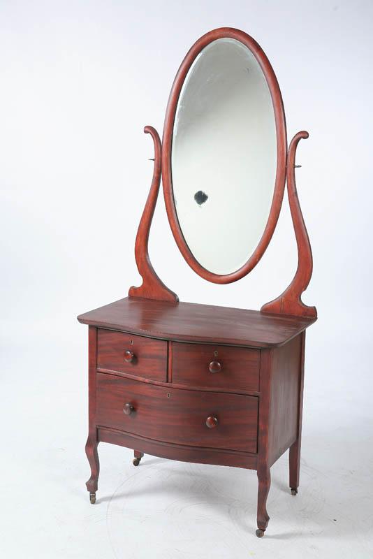 Appraisal: LOW DRESSER WITH MIRROR Mahogany with an oval mirror on