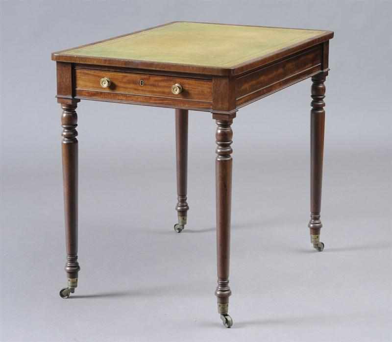 Appraisal: REGENCY CARVED MAHOGANY LIBRARY TABLE The tooled green leather top