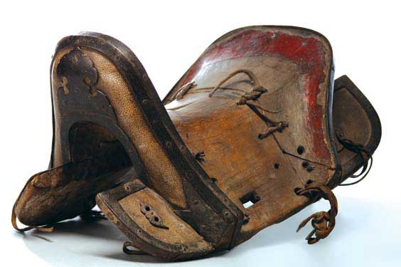 Appraisal: ANTIQUE SINO-TIBETAN SADDLE Antique Sino-Tibetan leather covered and iron mounted