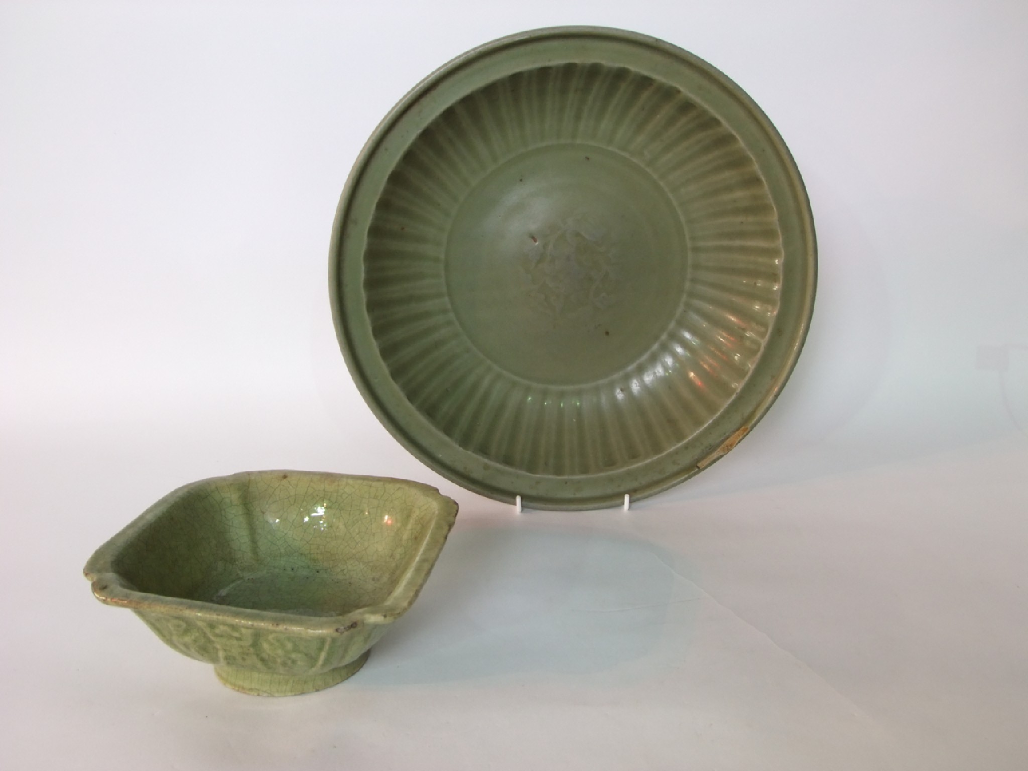 Appraisal: An oriental shallow bowl of circular form with celadon type