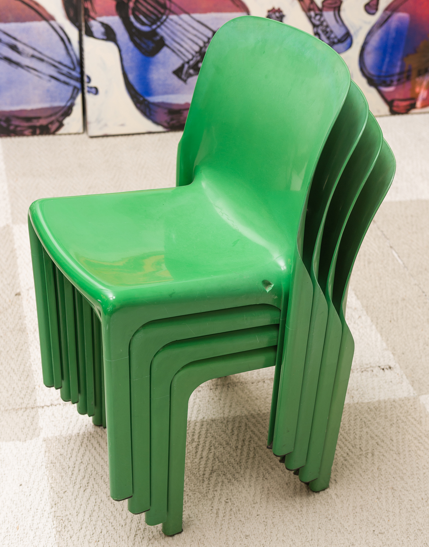 Appraisal: FOUR ITALIAN GREEN PLASTIC 'SELENE' CHAIRS DESIGNED BY VICO MAGISTRETTI