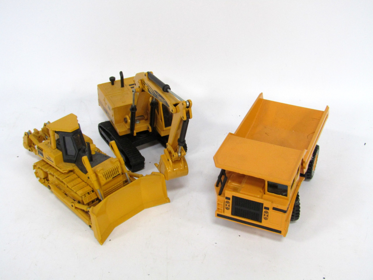 Appraisal: Die cast construction vehicles including Joal Excavators bulldozers dump trucks