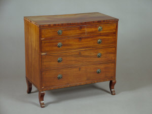 Appraisal: A Regency mahogany and ebony inlaid chest of drawers the