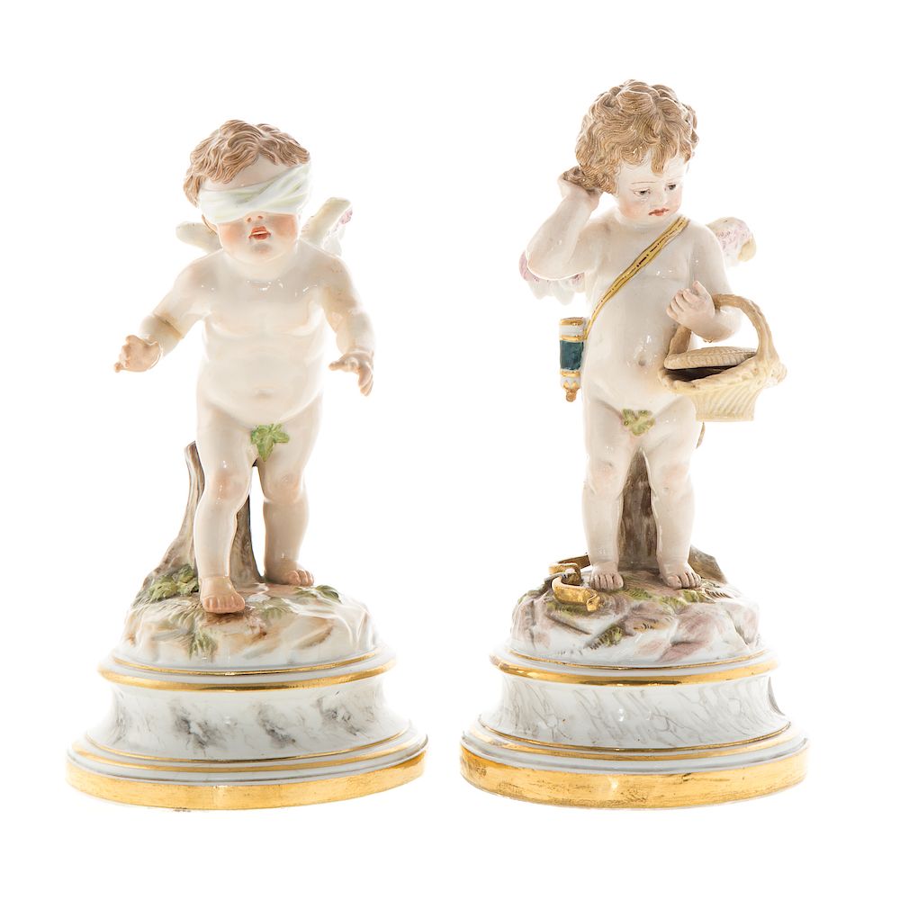 Appraisal: Two Meissen Porcelain Cupids late th century underglaze blue crossed