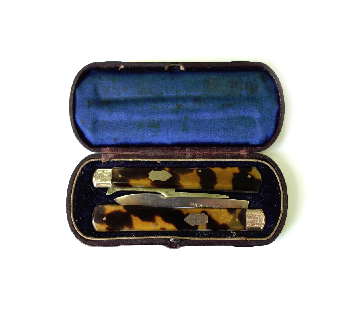 Appraisal: A Victorian silver gilt folding fruit knife and fork makers