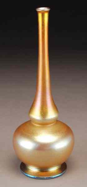 Appraisal: Tiffany gold Favrile glass bulbous stick vase of footed genie