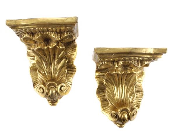 Appraisal: A pair of Rococo gilt wood wall brackets height in