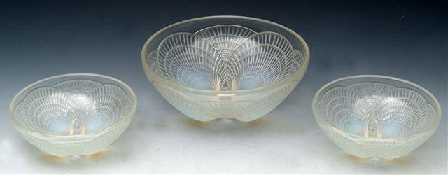 Appraisal: A PAIR OF LALIQUE OPALESCENT 'COQUILLES' PATTERN SMALL BOWLS and