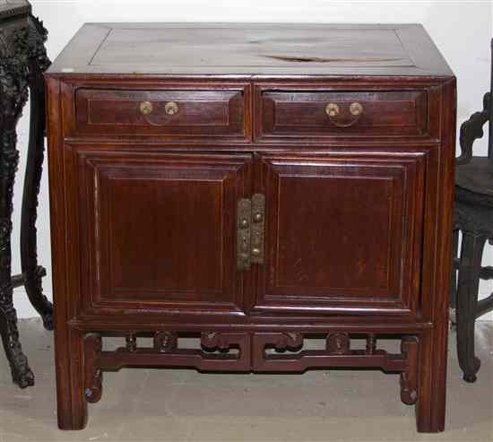 Appraisal: A Chinese Hardwood Cabinet having a rectangular top over two