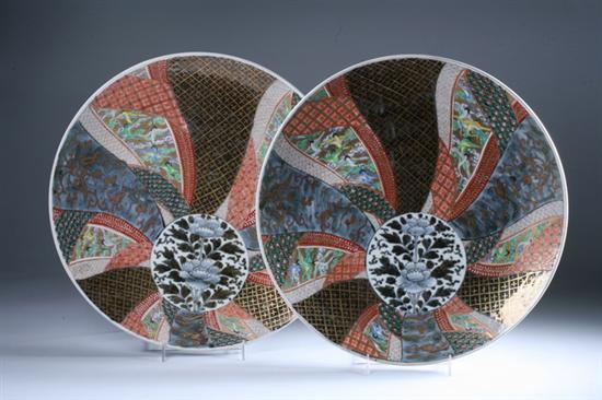 Appraisal: PAIR JAPANESE PORCELAIN CHARGERS Meiji period Painted to depict floral