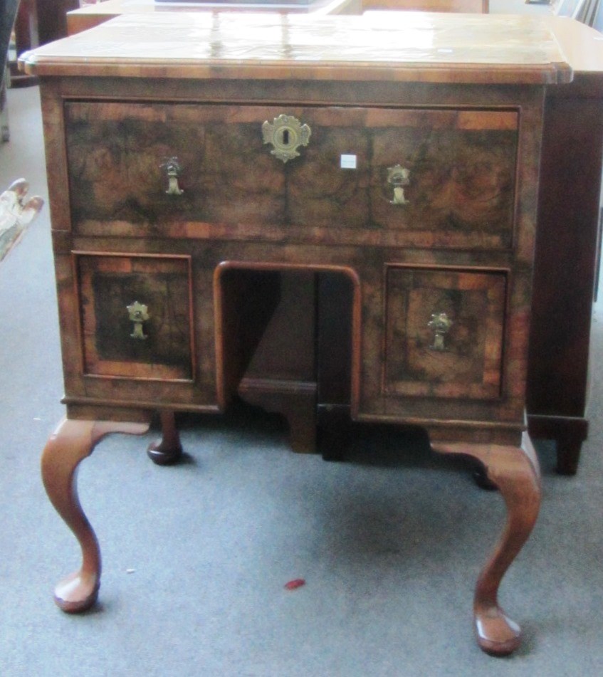 Appraisal: A made up th century oyster veneered walnut three drawer