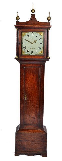 Appraisal: A HOUR OAK CASED LONG CASE CLOCK shaped pediment with