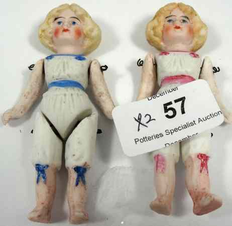 Appraisal: German Miniature Bisque Porcelain Dolls in pink and blue