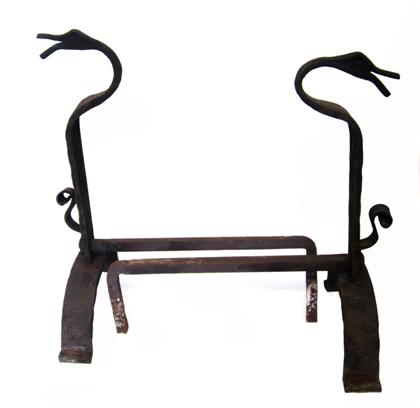 Appraisal: Pair of wrought iron and irons in the manner of