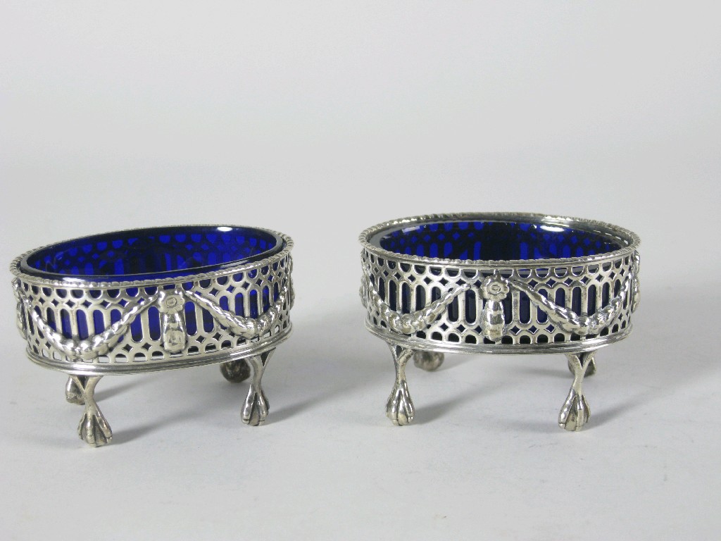 Appraisal: Pair of George III pierced oval Salts with swag design