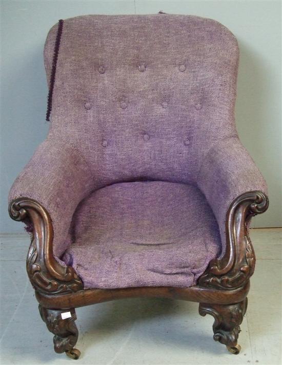 Appraisal: Victorian mahogany framed button backed arm chair with scroll carved