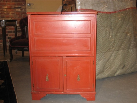 Appraisal: CHINESE STYLE BURNT ORANGE SIDE CABINET th c the painted