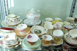 Appraisal: LARGE COLLECTION OF ENGLISH CHINA CUPS SAUCERS PLATES LIMOGES MINIATURES