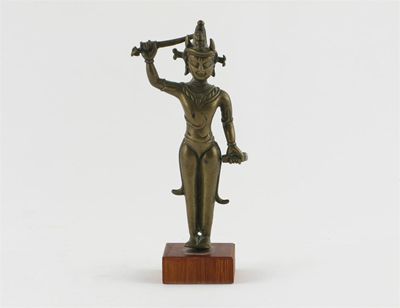 Appraisal: A Tibetan bronze figure of Manjusri standing holding a sword