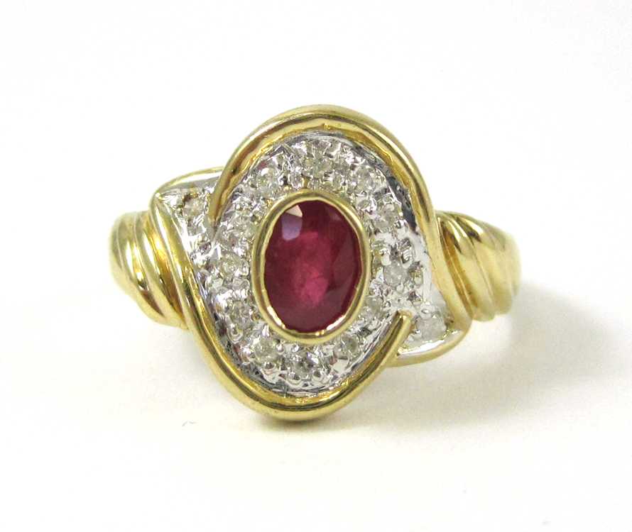 Appraisal: RUBY DIAMOND AND FOURTEEN KARAT GOLD RING with round-cut diamonds