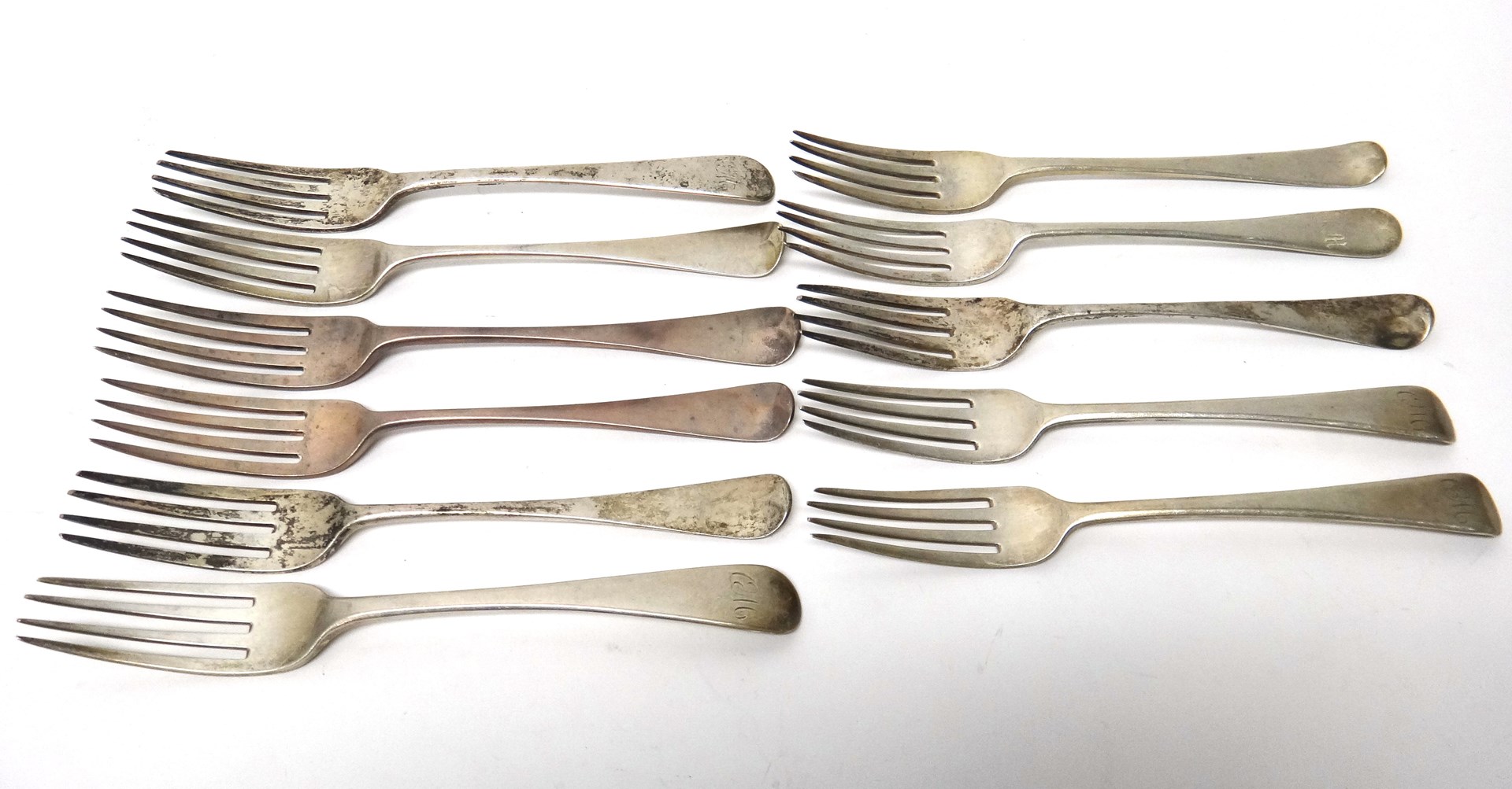 Appraisal: Two pairs of silver Old English pattern table forks London