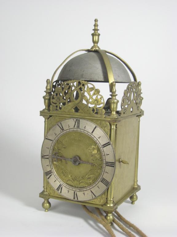 Appraisal: A brass Lantern Clock with pierced gallery top turned baluster