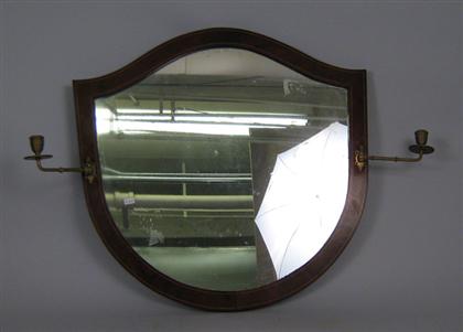 Appraisal: Two mirrors One of shield shape with two brass candle