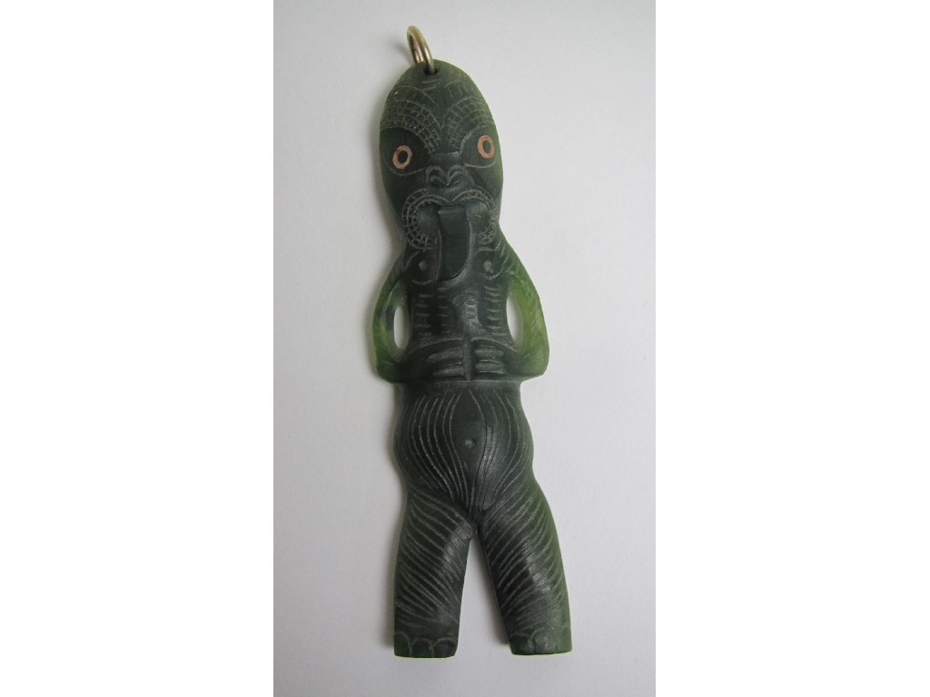 Appraisal: A Maori jade carving of a standing figure with tattooed