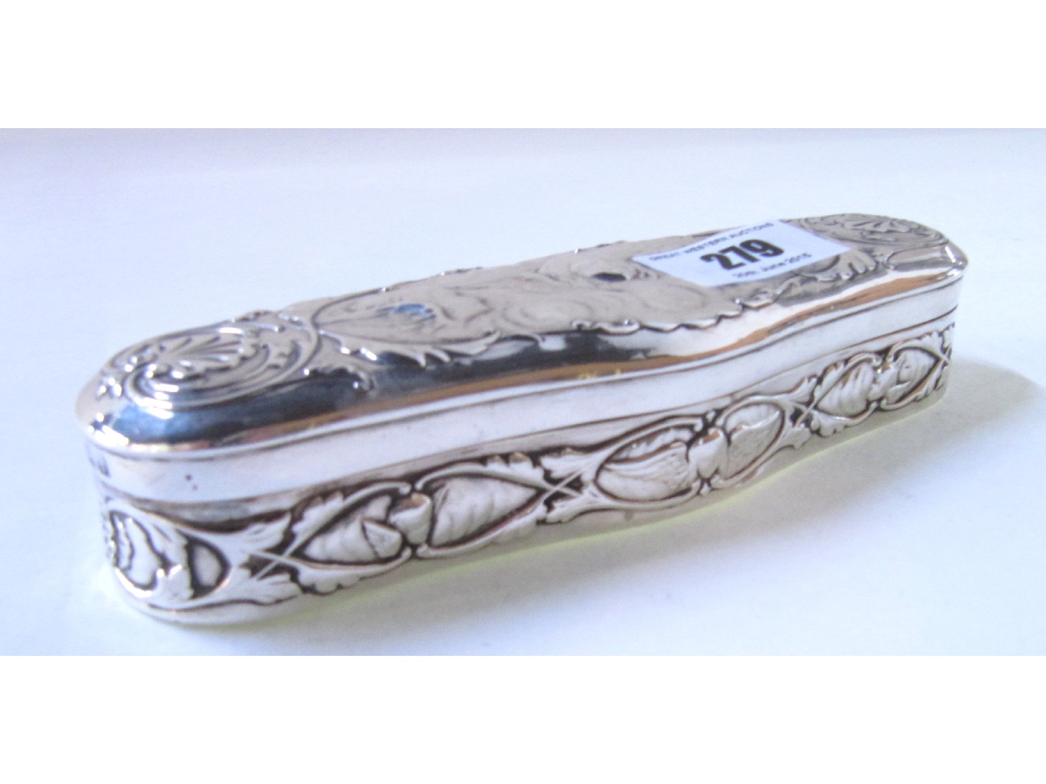 Appraisal: An embossed silver trinket box London