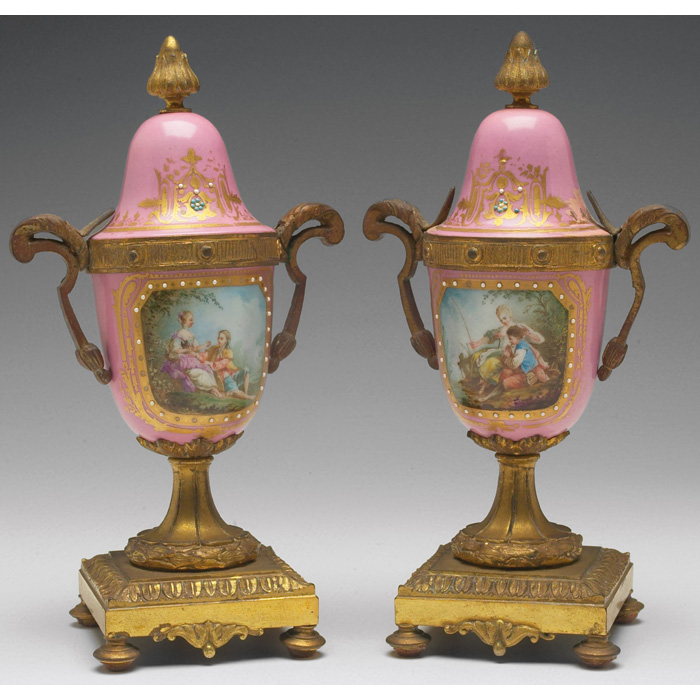 Appraisal: Sevres urns pair each decorated with a courting scene and