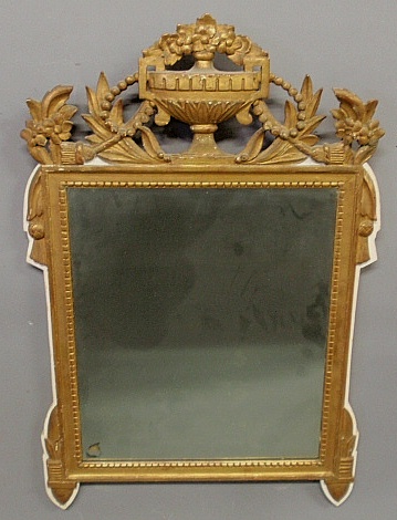 Appraisal: - Italian style carved gilt framed mirror c with an