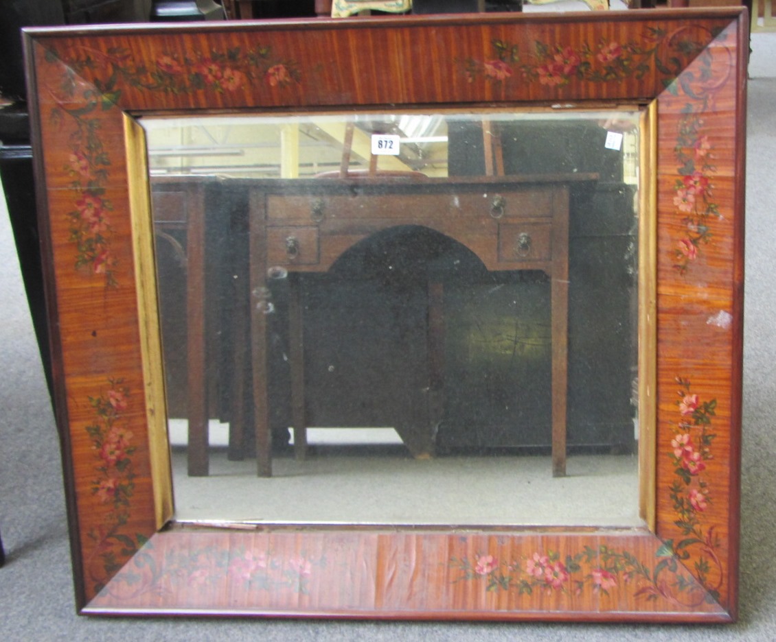 Appraisal: A th century floral painted satinwood rectangular wall mirror x