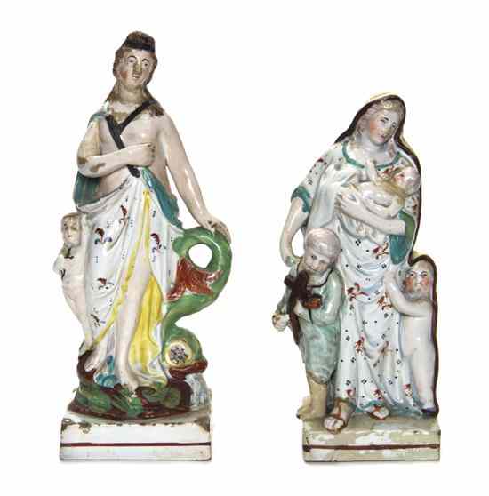 Appraisal: Two Staffordshire Figures each depicting a woman with children Height