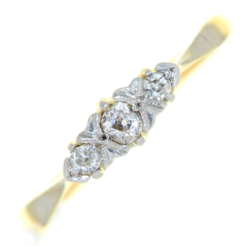 Appraisal: A three stone diamond ring gold hoop marked ct PLAT