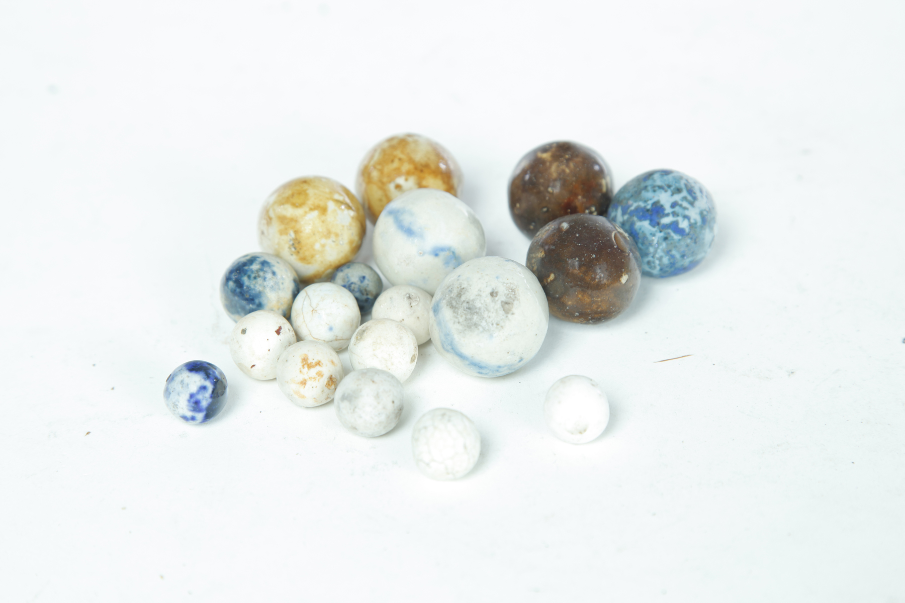 Appraisal: GROUP OF POTTERY MARBLES All likely Ohio late th century