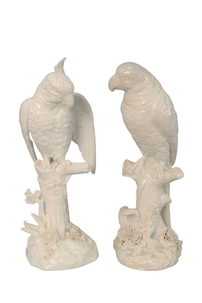 Appraisal: Pair of German Porcelain Parrots sitting on tree stumps Blanc