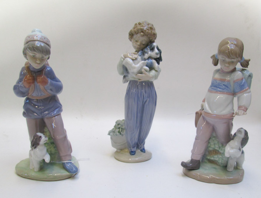 Appraisal: THREE LLADRO PORCELAIN FIGURINES Thursday's Child Boy and Thursday's Child