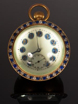 Appraisal: A spherical glass paperweight clock with paste border fitted an