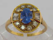 Appraisal: An carat gold sapphire and diamond ring the central oval