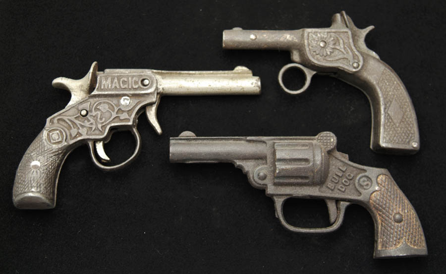 Appraisal: LOT OF THREE CAST IRON CAP GUNS To include a