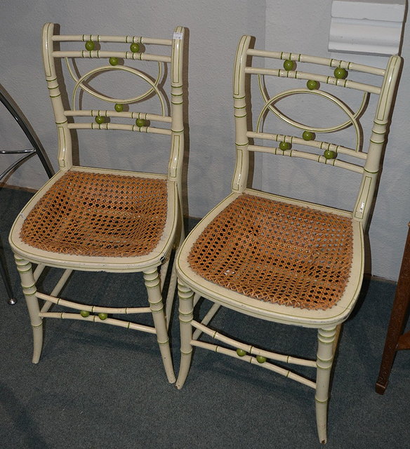 Appraisal: Pair of painted simulated bamboo bedroom chairswith cane seats three