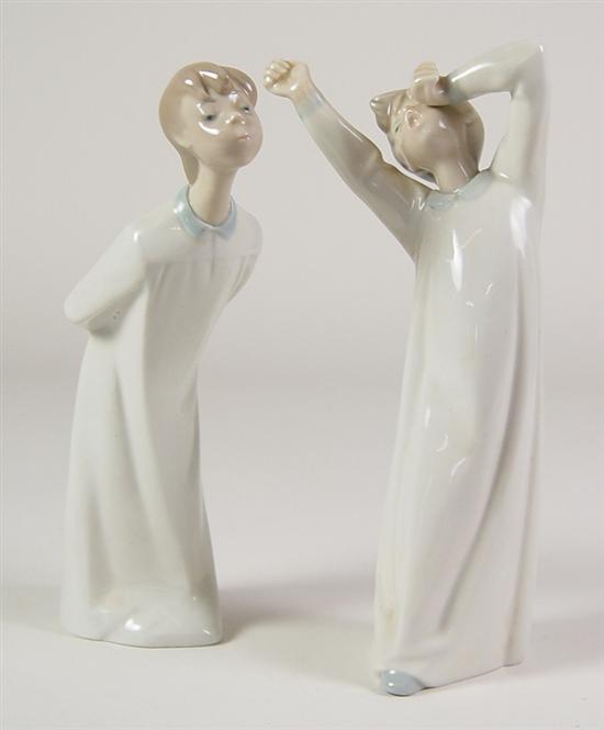 Appraisal: Lladro Boy Girl high boy Awakening high girl Kissing Both