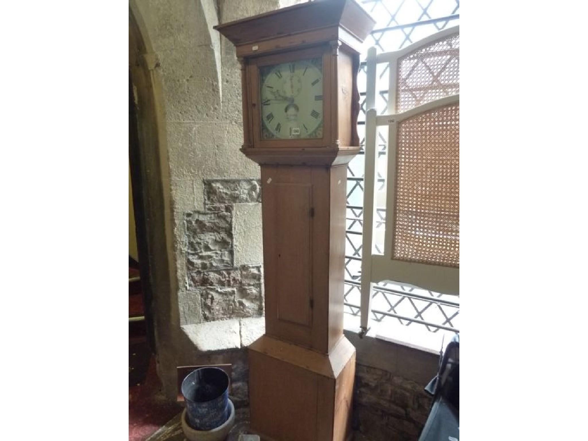 Appraisal: A th century cottage longcase clock with stripped pine case