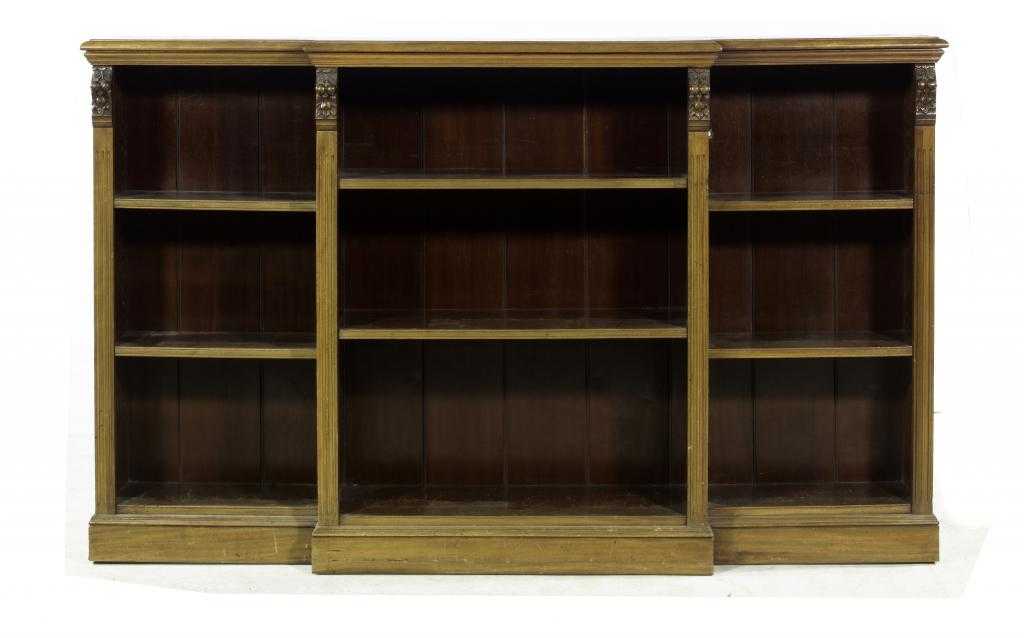 Appraisal: A VICTORIAN WALNUT BREAKFRONT OPEN BOOKCASE the moulded top above