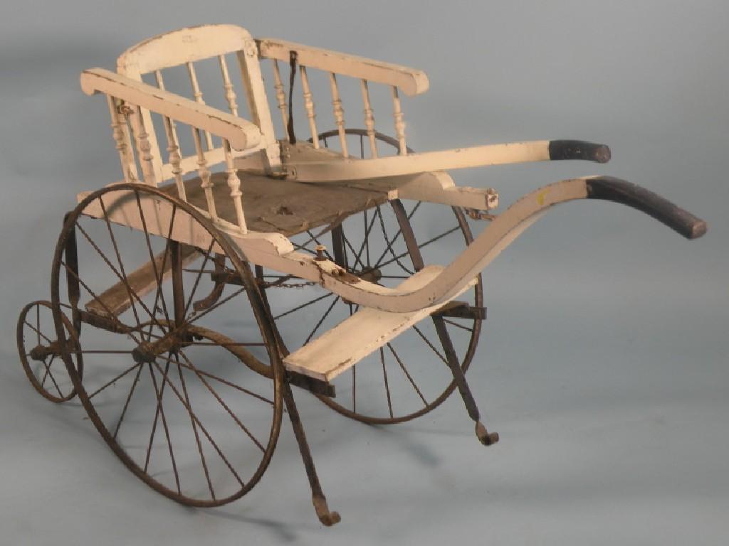 Appraisal: A Victorian white painted invalid carriage cart