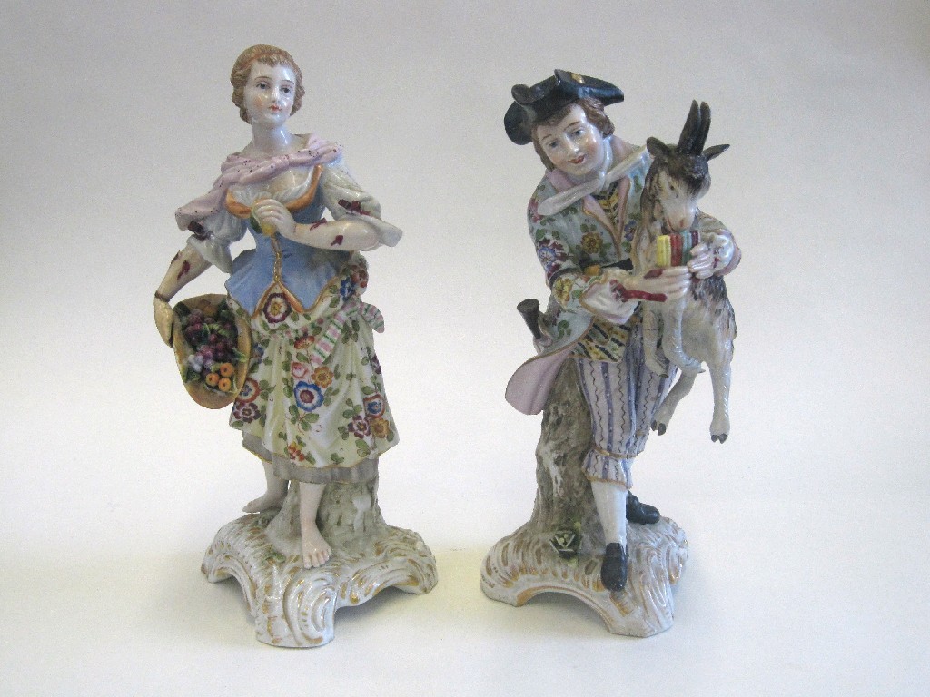 Appraisal: Pair of Sitzendorf porcelain figures the man carrying a goat