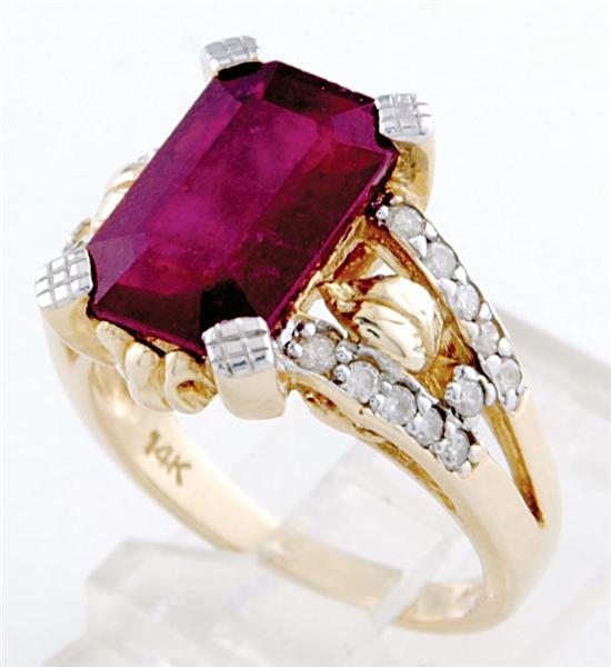 Appraisal: Ruby and diamond cocktail ring by Neimans carat emerald-cut ruby