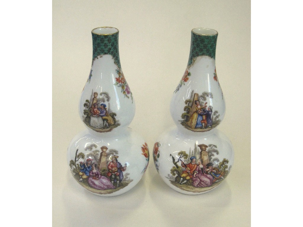 Appraisal: Pair of Dresden double gourd vases each handpainted with scenes